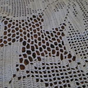 Hand crocheted table cloth approximately 50"x70" white pointsettia pattern